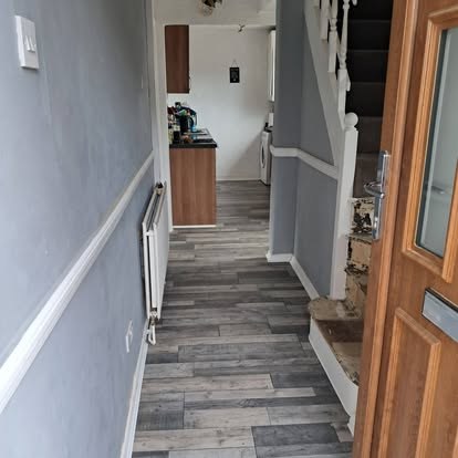 Renovated hallway with new flooring